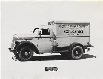 (TRUCKING AND TRANSPORT) Contemporary binder containing 112 photographs of commercial vehicles, most with hand-lettered signage.